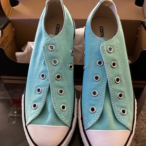 Converse Sneakers. New with Tags, missing laces. Kids Size 3
